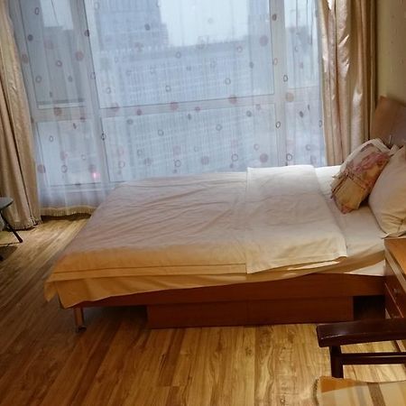 Dalian Yidian Yijing Huayuan Apartment Zimmer foto